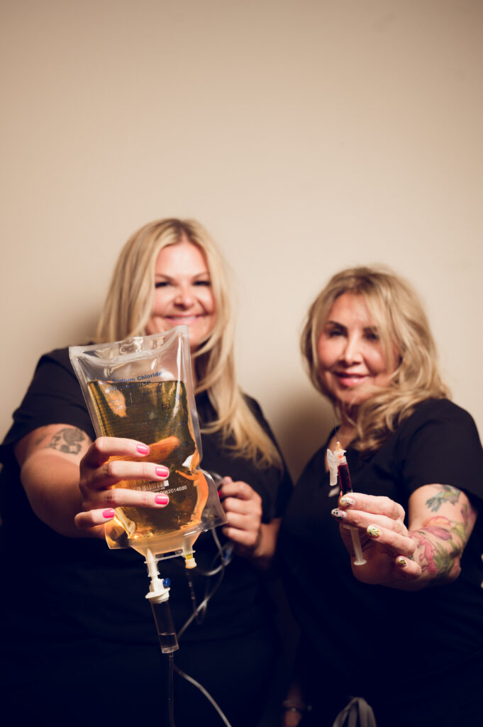 The ElementZ Wellness team preparing personalized IV hydration therapy in Brighton, Michigan.